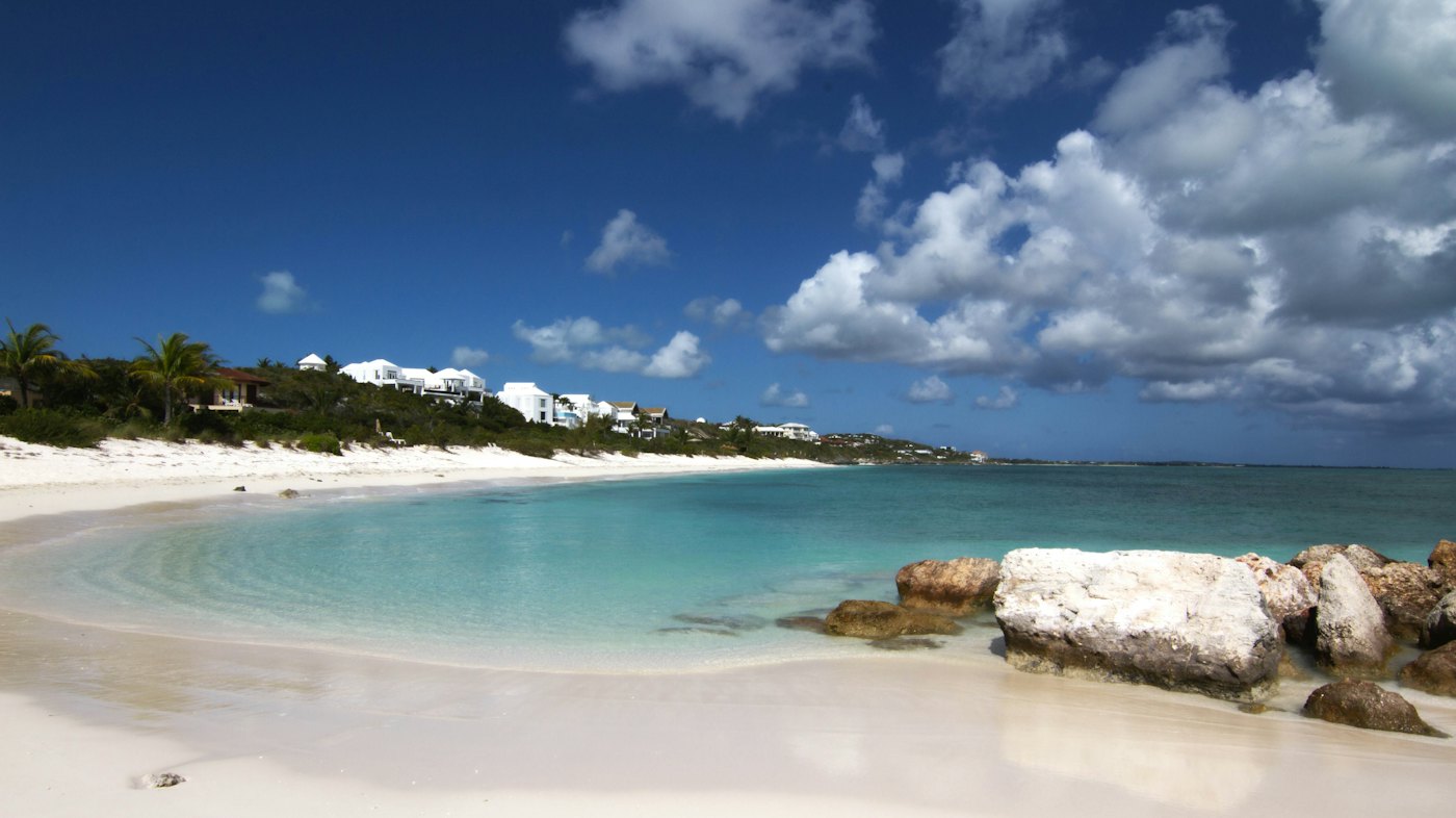 White sand and clear turquoise shallows on a Caribbean bay